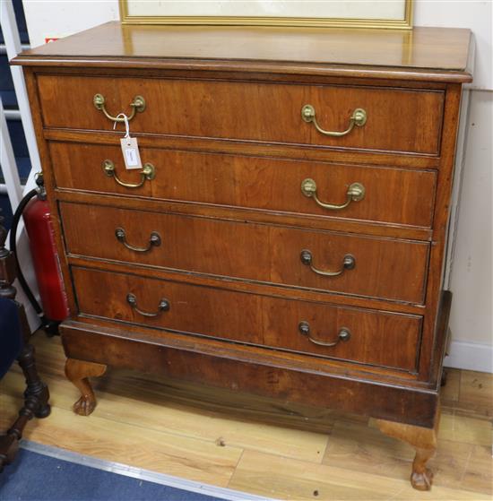 A teak chest on stand fitted four long drawers w.98cm